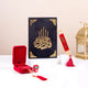 Premium Eid gift set from Barakah Velvet Gift Hamper with black velvet Quran, red Tasbeeh, digital counter, and decorative Islamic bookmark.
