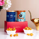 Himalayan Caramel Duo Gourmet Popcorn in elegant tins with red gift box, perfect for housewarming, Hajj & Umrah, and Daawat-e-Khaas celebrations.