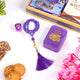 Velvet Bliss & Nut Hamper includes a purple velvet prayer box, tasbih, digital counter, and gourmet snacks, ideal for Ramadan and Eid gifting.