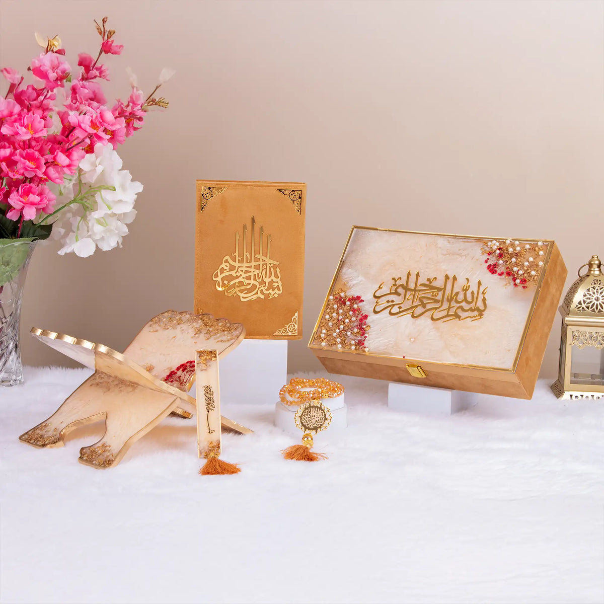 Golden Floral Pearl Rehal Hamper with velvet Quran, resin Rehal, crystal tasbeeh, and bookmark. Elegant Islamic gift set for special occasions.