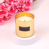 Midnight Rose scented candle in gold holder from Noor Al-Midnight Delight Hamper, a luxurious touch to this Islamic gift hamper for Ramadan.