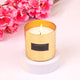 Midnight Rose scented candle in a golden holder, part of the Noor Al-Nazakat Sweet Treats Hamper. Adds elegance and aroma to premium gift hampers.