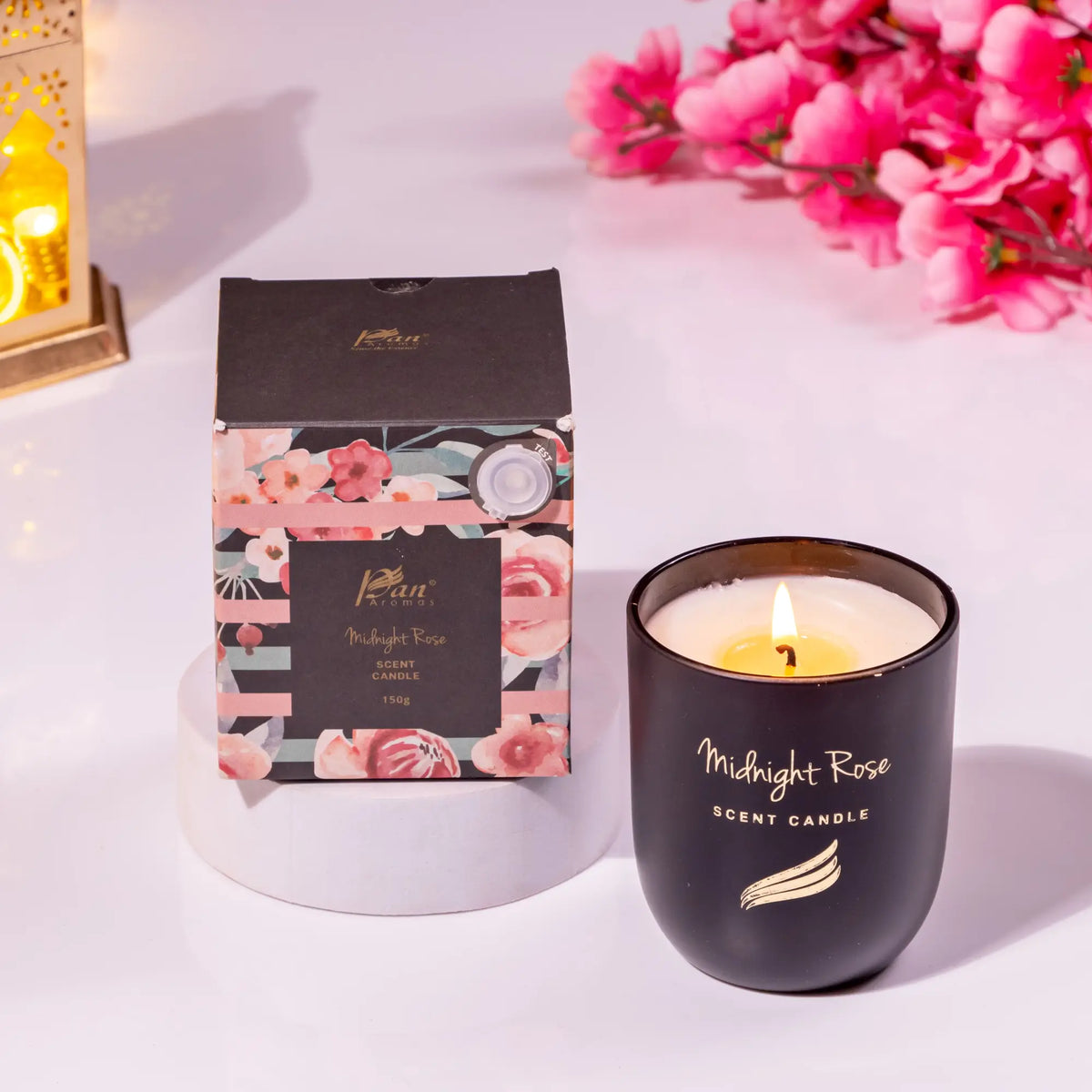 Midnight Rose scented candle in black glass with floral box packaging. Included in Noor Al-Sweets & Serenity Hamper for Ramadan and Eid gifts.