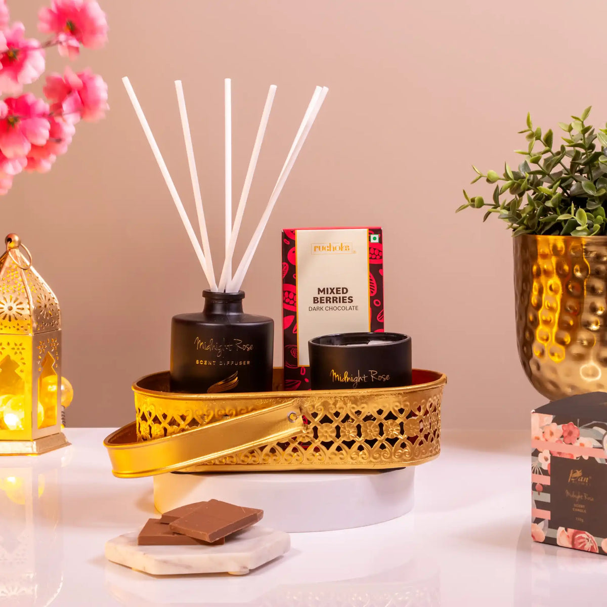 Midnight Elegance Gift Hamper - Perfect Islamic Gift | Premium Treats featuring scented candle, diffuser, and dark chocolate in a gold tray.