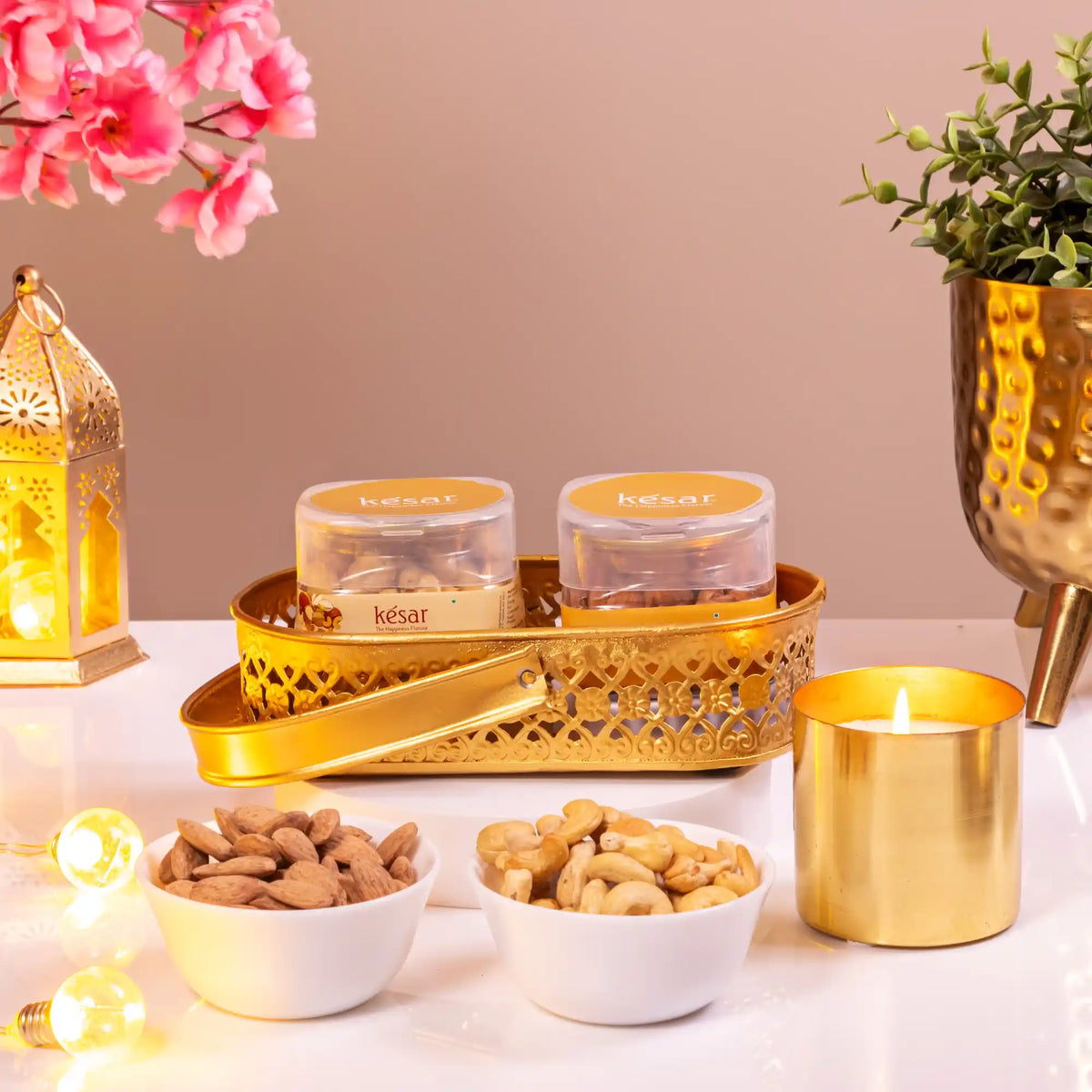 Elegant Noor Al-Midnight Delight Hamper featuring dry fruits in jars, golden tray, and candle, ideal Islamic gift hamper for Eid and Ramadan.