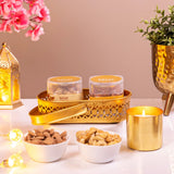 Elegant Noor Al-Midnight Delight Hamper featuring dry fruits in jars, golden tray, and candle, ideal Islamic gift hamper for Eid and Ramadan.