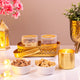 Elegant Noor Al-Midnight Delight Hamper featuring dry fruits in jars, golden tray, and candle, ideal Islamic gift hamper for Eid and Ramadan.