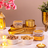 Premium Noor Al-Midnight Delight Hamper with almonds, cashews, golden candle, and ornate tray, perfect Ramadan gift hamper for festive occasions.