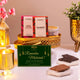 Sweet Treats Hamper - Ramadan Gifts featuring premium chocolates, almonds, and a festive greeting card in a golden tray. Ideal for Eid gifting.