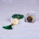Elegant 100 Beads Green Crystal Tasbeeh featuring gold Bismillah medallion, perfect for Hajj, Umrah, or bridal gifting.
