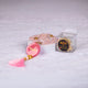 Elegant Pink Crystal Tasbeeh with personalized name and tassel, presented with branded gift box, perfect for men and women.