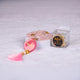 Pink Sequence Rehal Hamper - Premium Quran Gift Set Online featuring a pink crystal Tasbeeh with personalized name tag and elegant packaging. Ideal for Islamic gifting.