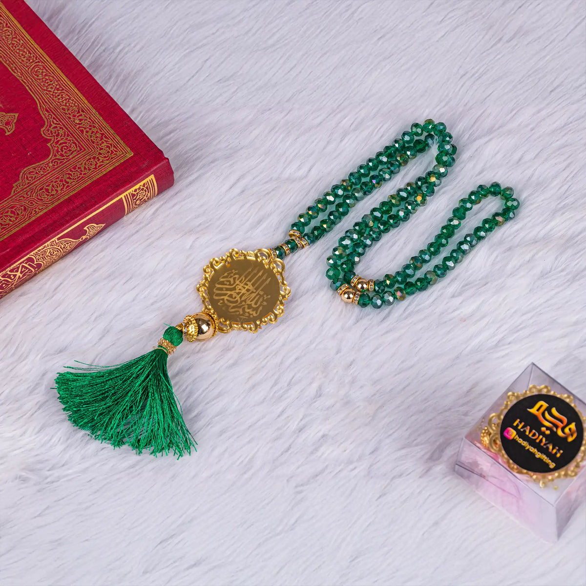 Elegant green tasbeeh with gold Islamic calligraphy charm, included in the Bridal Hamper - The Bling Collection for spiritual wedding gifts.