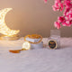 Golden Tasbeeh with tassel and branded packaging from the Golden Sequence Tilawat-e-Quran Gift Hamper, ideal for gifting during Eid or Nikah.