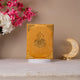 Velvet-covered premium Quran with golden Arabic calligraphy, included in the Golden Floral Pearl Rehal Hamper. Elegant Islamic gift for women and men.