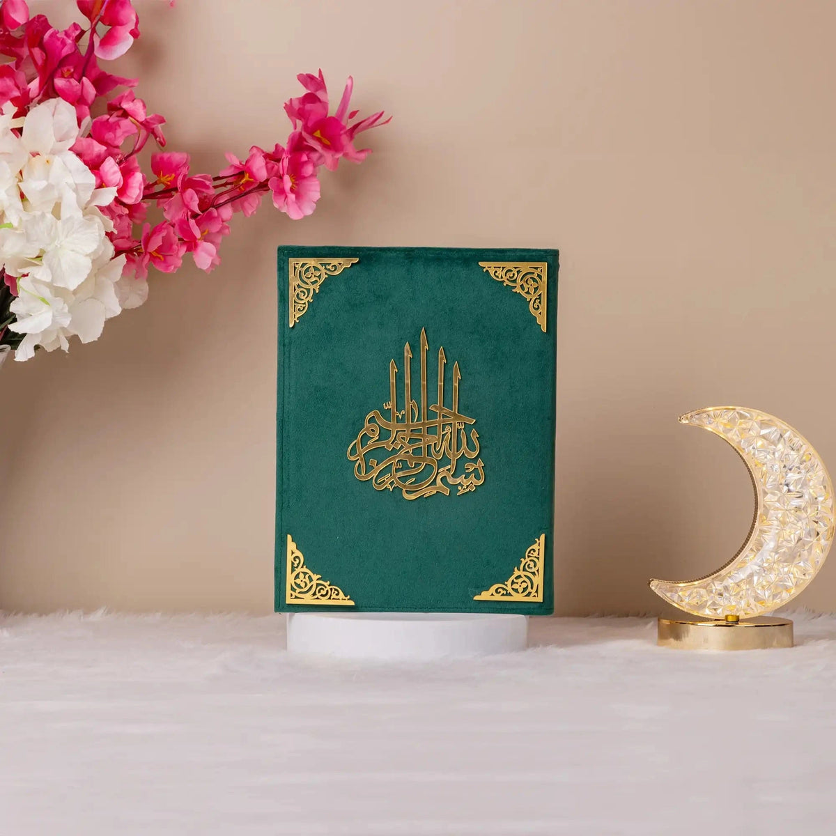 Green velvet Quran with gold calligraphy from the Green Stones Bridal Hamper. Perfect for Islamic bridal gifts and religious ceremonies.