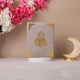 Gray Velvet Quran with gold detailing on display, premium translation Quran for gifting or religious use.