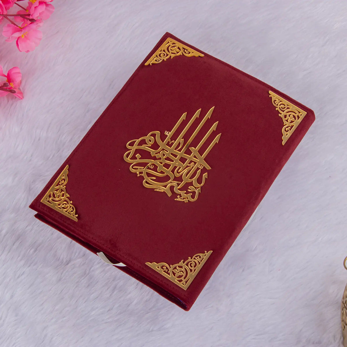 Elegant maroon velvet Quran with gold Arabic script, a luxurious and personalizable Islamic prayer essential gift.