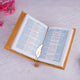 Golden Quran with blue and white translation pages and gold tassel bookmark, from the Golden Sawab-e-Jariya Bling Quran Gift Set.