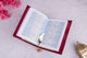 Open Velvet Quran showing bilingual Arabic-English translation, ideal for learning and gifting in multiple languages.