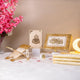 Elegant Offwhite Sawab-E-Jariya Quran gift set with gold-detailed box and book stand, perfect for religious gifting and ceremonial use.