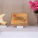 Golden Handmade Designer Velvet Quran Box with floral resin accents and Arabic script. A beautiful Islamic gift for Ramadan and prayer storage.