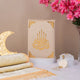 Velvet-covered Quran with golden Islamic calligraphy from the Rehal Bridal Hamper, paired with tasbeeh and prayer mat for ceremonial gifting.