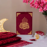 Maroon Salah Combo featuring a velvet Quran with gold detailing, prayer mat, and Tasbeeh, styled with floral decor for elegant religious gifting.