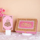 Pink velvet Quran with golden calligraphy displayed with floral decor, part of the Butterfly Quran Gift Set - Pink Butterfly Sawab-e-Jariya.