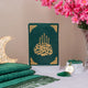 Green Salah Combo Hamper featuring premium velvet Quran, prayer rug, and tasbeeh, styled with pink flowers and crescent lamp.