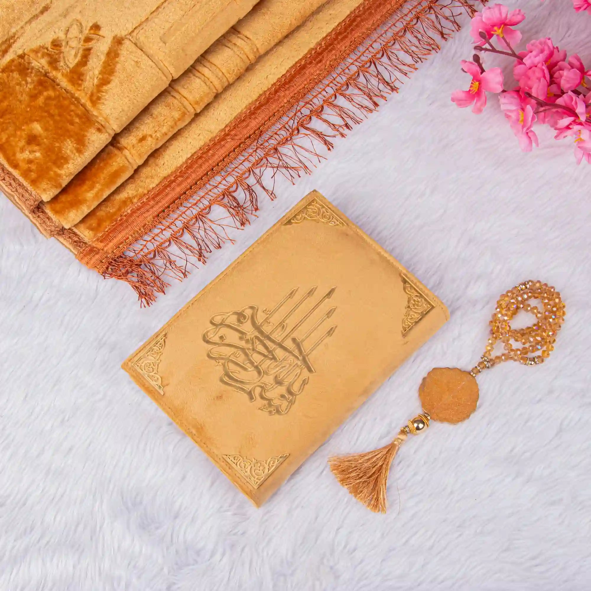 Golden Salah Combo Hamper with velvet Quran, golden Janamaz, and crystal Tasbeeh on white fur background. Ideal Islamic gift set. Main image