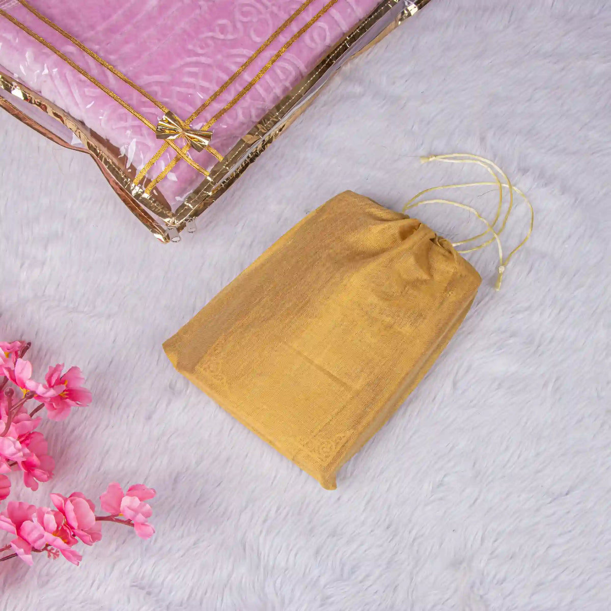 Golden drawstring pouch from the Butterfly Quran Gift Set - Pink Butterfly Sawab-e-Jariya, ideal for storing prayer essentials or gifting.