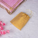 Golden drawstring pouch from the Butterfly Quran Gift Set - Pink Butterfly Sawab-e-Jariya, ideal for storing prayer essentials or gifting.