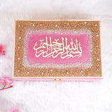 Decorative pink and gold Bismillah gift box with floral background – elegant packaging from Pink Sequence Tilawat-e-Quran set by Hadiyah