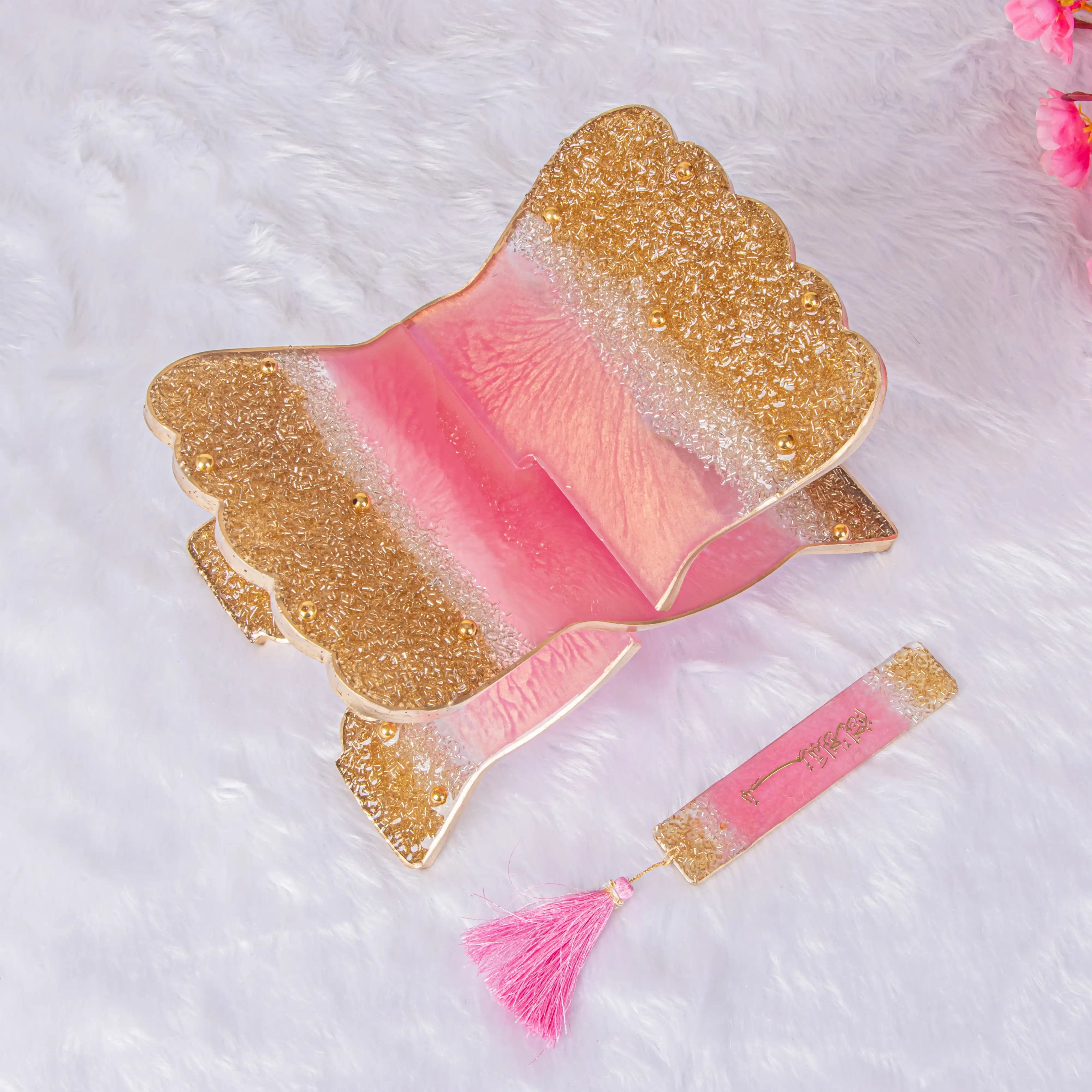 Handmade Quran holder gift set featuring a pink and gold glitter resin Rehal with matching bookmark, ideal for Islamic gifts and bridal hampers. Main image