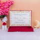 Open Maroon Majestic Nikah Nama Hamper displaying printed Nikah certificate with gold border, perfect for religious wedding ceremonies.