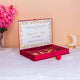 Inside view of Maroon Majestic Nikah Nama Hamper showing thumb print edition certificate and accessories in a velvet-lined box.