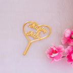Custom gold heart name tag reading 'Shazia & Shifa', ideal for personalized Nikah or wedding gift hampers.