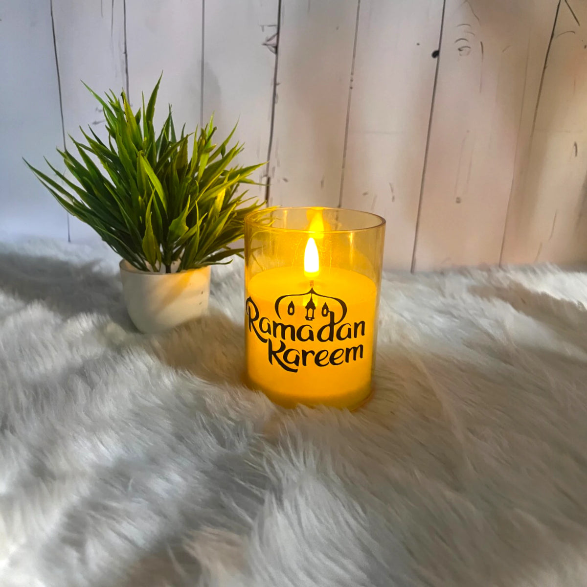 Personalized LED Candle with 'Ramadan Kareem' text, warm glow lighting for Ramadan home decor and gifting.