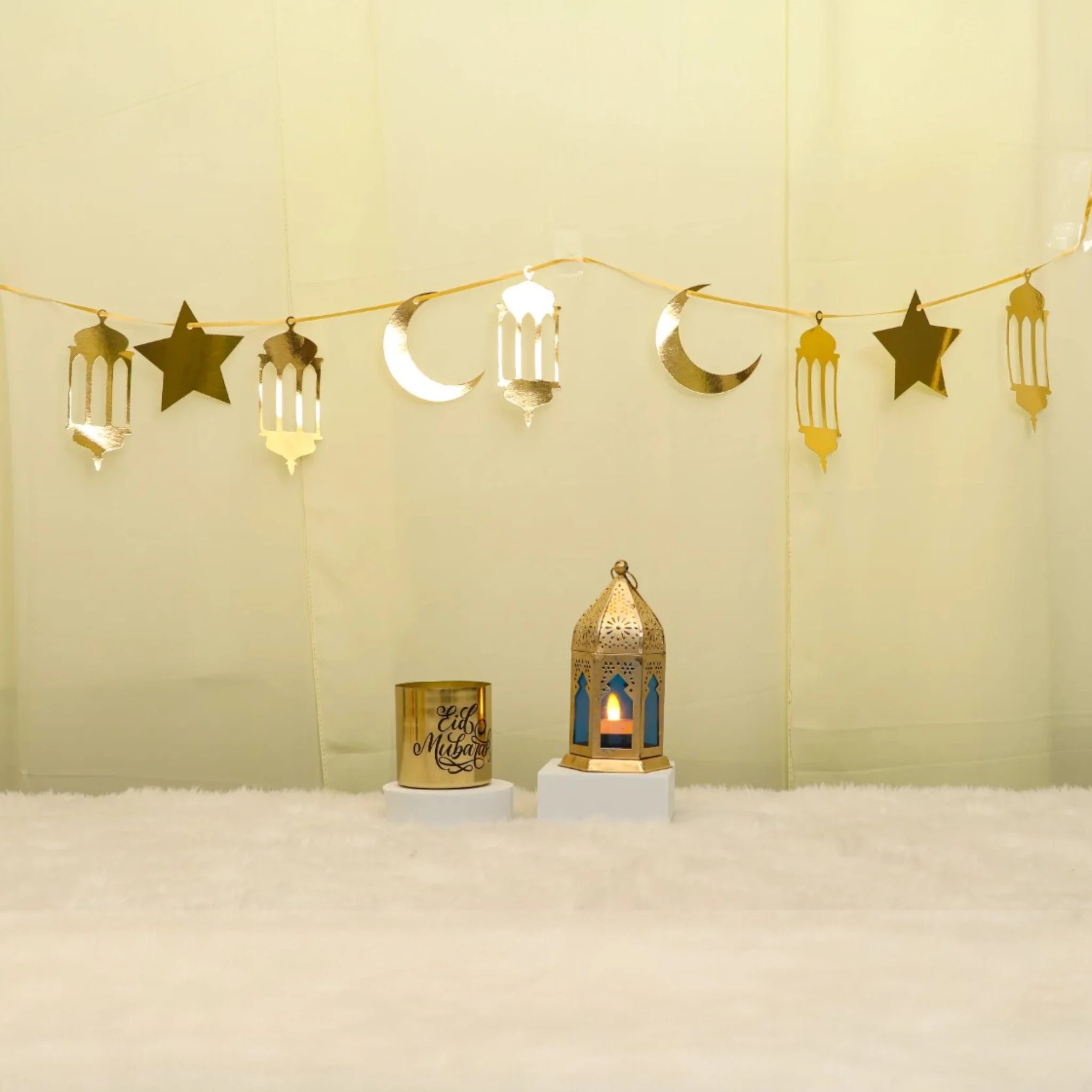 Lunar Serenity Decor Set - Eid Decor Set with gold star and moon banner, medium lantern, and Eid Mubarak scented candle for festive home decor. Main image