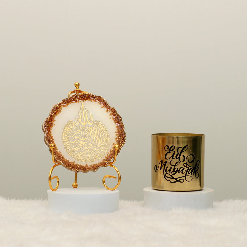Divine Light Decor Set - Eid Decor Set with Ayatul Kursi frame in white and gold, paired with a gold Eid Mubarak candle. Ideal for festive home decor. Main image