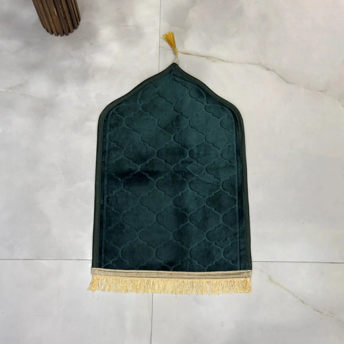 Close-up of Green Kids Dome Prayer Rug with dome shape and tassels; soft, foldable, and ideal for young children's daily prayers.