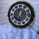 standing clock with support of wall 