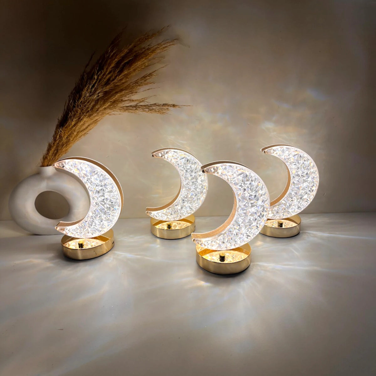 Set of four Crystal Touch Moon Lamps with glowing crescent design, ideal for Islamic home decor and festive lighting during Eid or Ramadan.