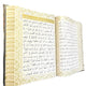 Open book with Arabic text on a white background