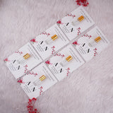 Premium Attar with Customised Card Nikah Favors in bulk – alcohol-free fragrance bottles on personalised couple initials cards, perfect Islamic wedding favors