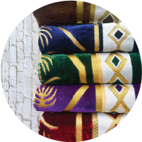 Janamaz Eyelet logo featuring a beautifully designed prayer rug with intricate eyelet detailing, symbolizing devotion and comfort, perfect for enhancing the spiritual experience of prayer.