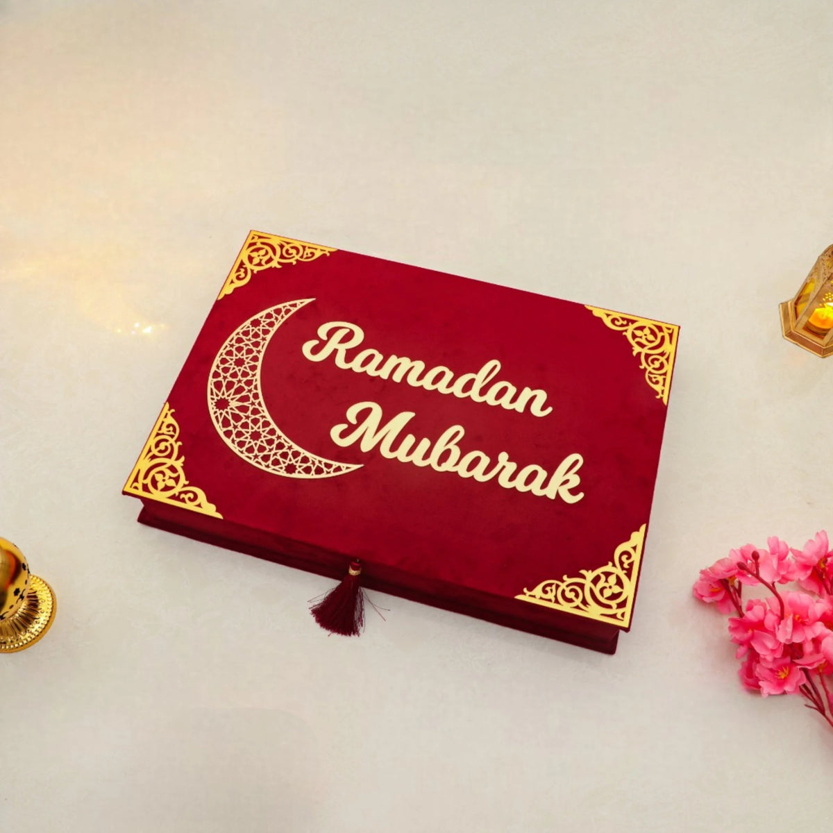 Closed red Jannah Treasures Ramadan Hamper box with 'Ramadan Mubarak' and crescent moon design, perfect for elegant Ramadan gift presentation.