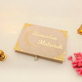 Beige Jannah Treasures Ramadan Hamper closed box with 'Ramadan Mubarak' and crescent moon design, elegant for ceremonial gift giving.