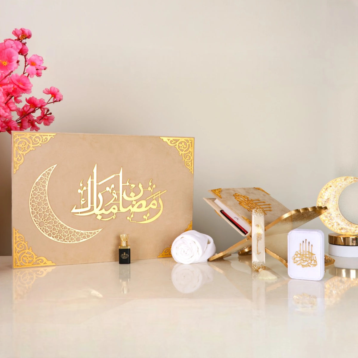 Luxurious beige Jannah Treasures Ramadan Hamper with Arabic calligraphy, includes spiritual essentials like Quran, tasbeeh, and miswak.